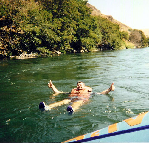 Dad gives his Thumbs Up while floating in the river in Washington